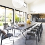 OFFRE SPÉCIALE : Table de jardin extensible Axiome Ardoise granitée 12 pers + 8 Fauteuils Essentia Graphite 